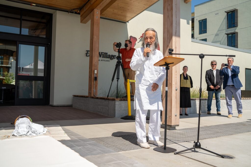 Artist standing with microphone