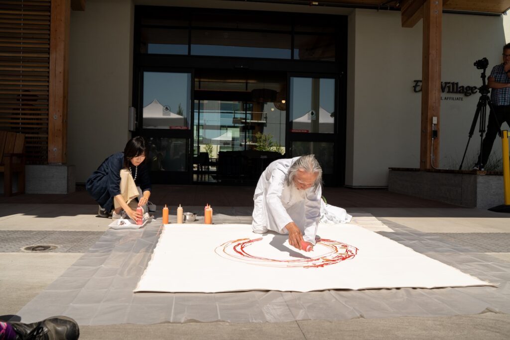 Artist laying down paint